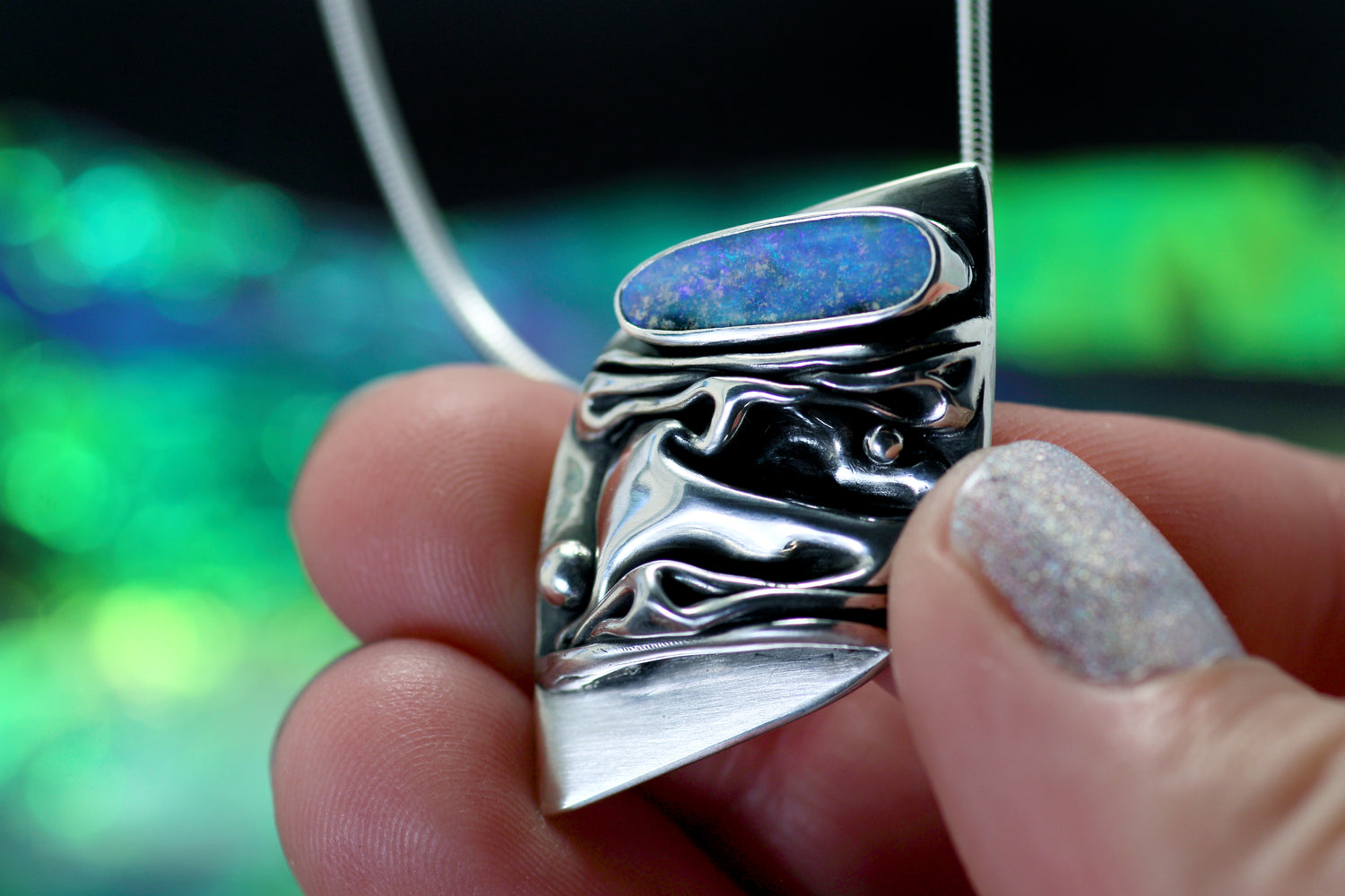 CORAL Artful silver pendant with ocean-blue opal 