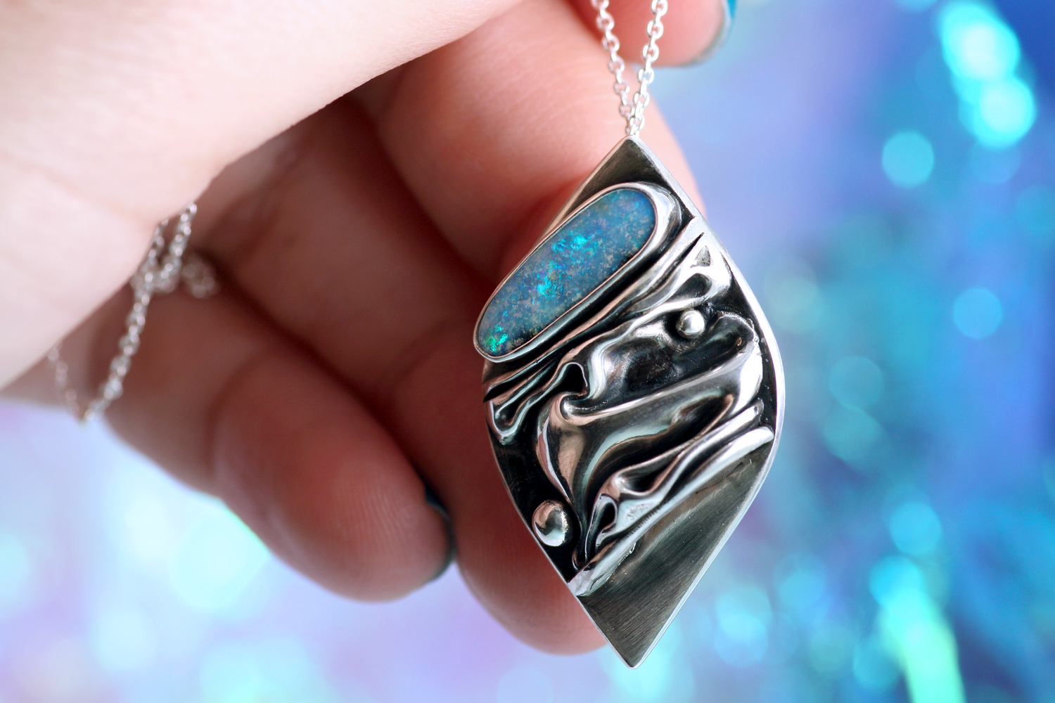 CORAL Artful silver pendant with ocean-blue opal 