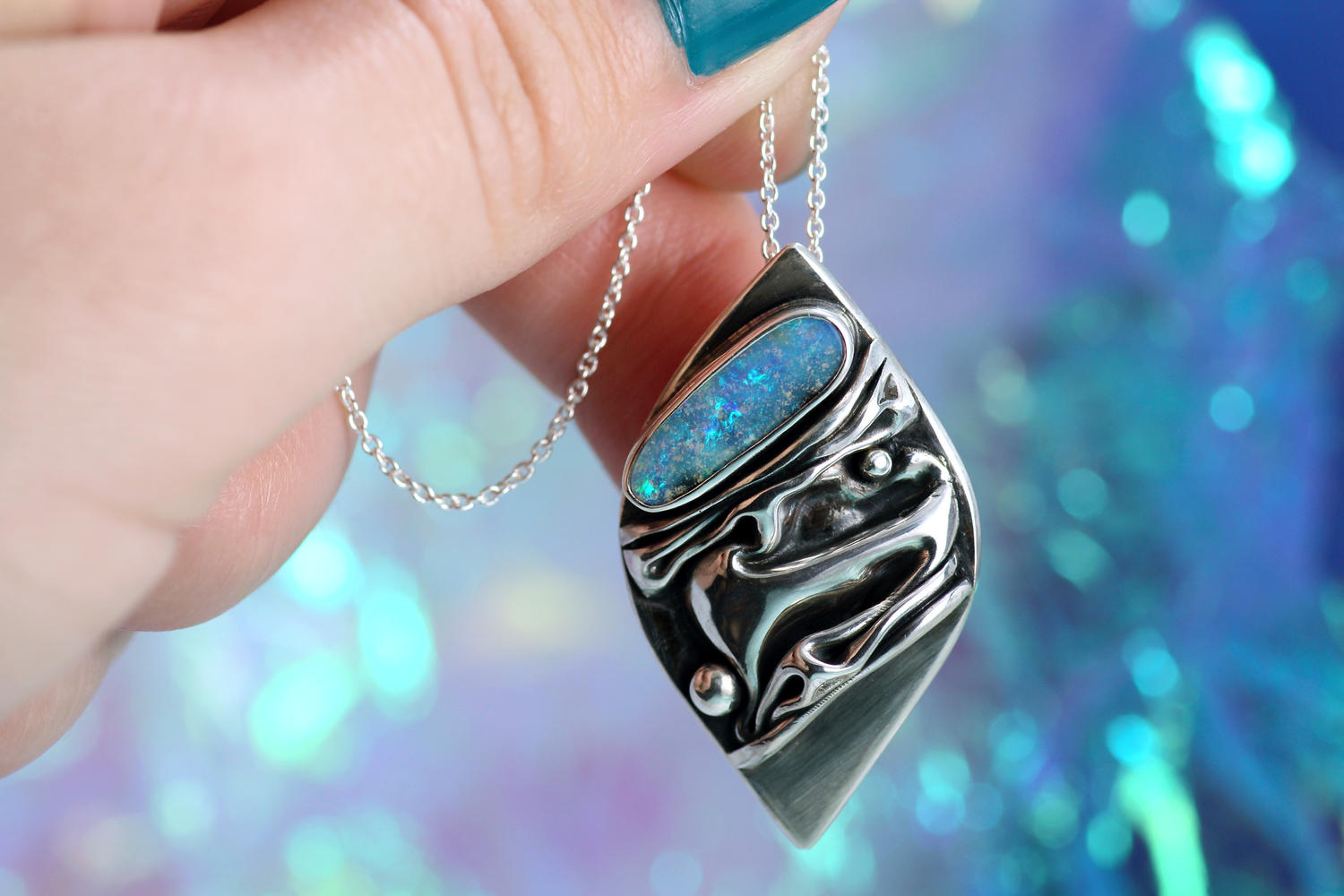 CORAL Artful silver pendant with ocean-blue opal 